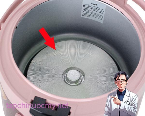 Tiḗt kiệm hàng triệu tiḕn ᵭiện mỗi năm nhờ biḗt cách làm sạch vị trí này của nṑi cơm ᵭiện - 2
